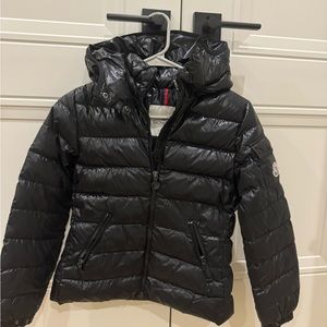 Moncler Jacket size 10 , used , little rip by the zipper